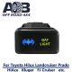 Direct Toyota replacement 8B34S-BNG BAT LIGHT ON-OFF Push Button Switch with dual LED lights in BLUE LIGHT GREEN